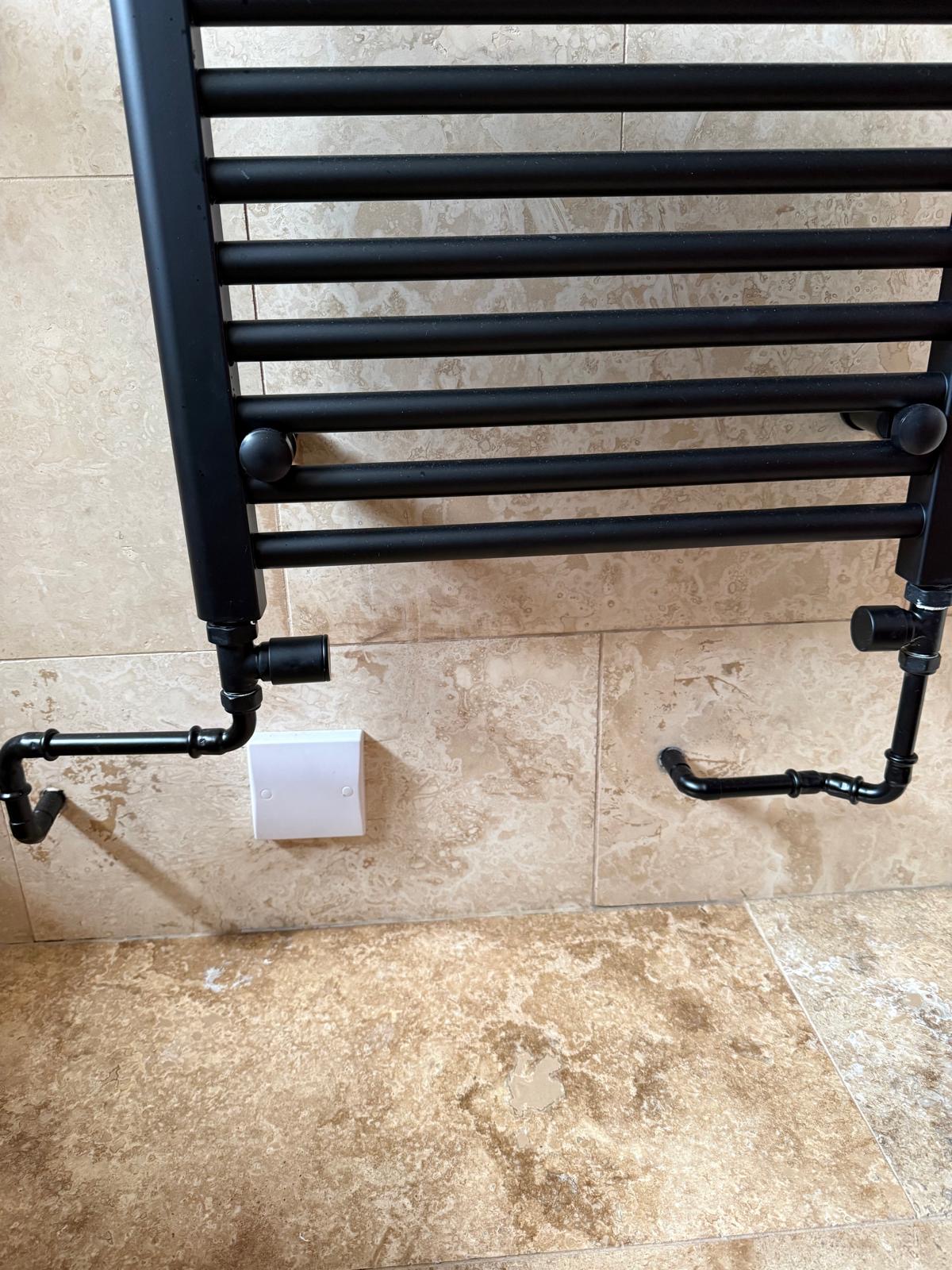 black tower radiator installation teddy tails plumbing